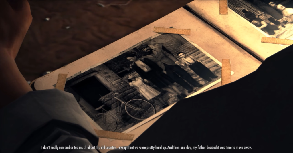 Руки держат старую семейную фотографию в альбоме