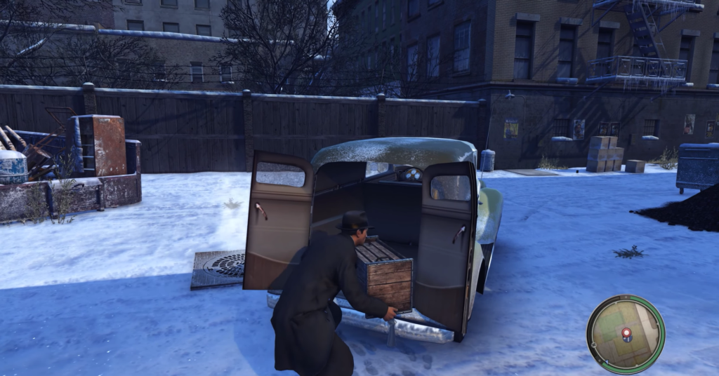 Персонаж грузит ящик в фургон на снегу