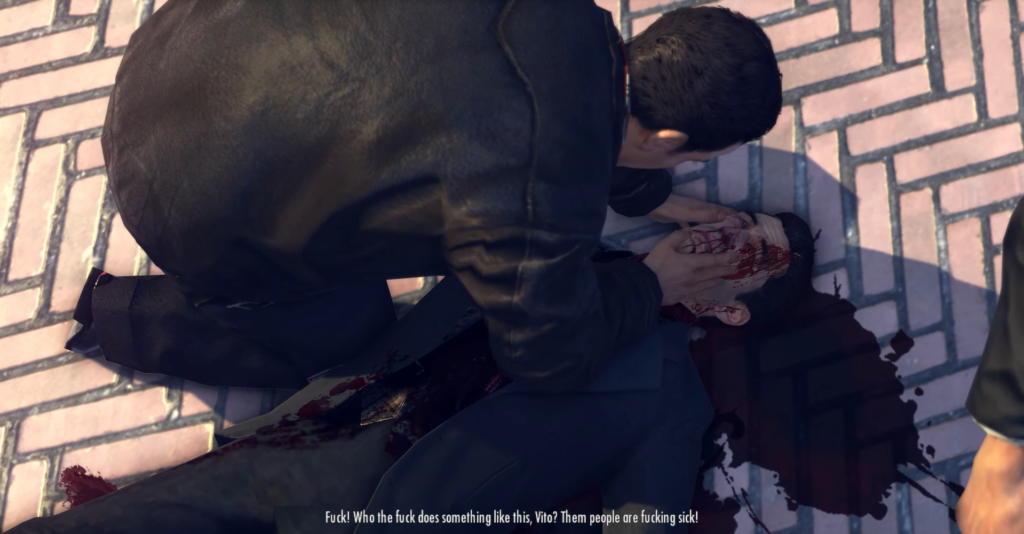 Вито Скалетта из Mafia II держит раненого на мостовой