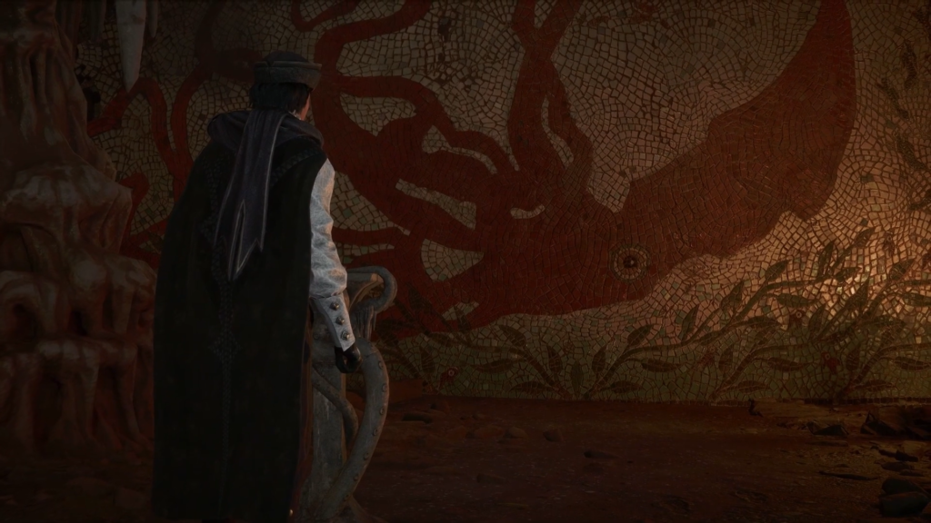 Мужчина в черном плаще смотрит на мозаику осьминога