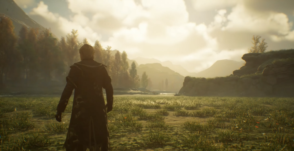 Фигура в плаще идет по долине к горам