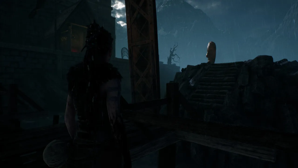 Сенуа из Hellblade стоит у лестницы ночью