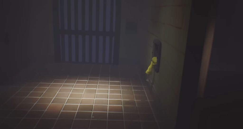 Шестая из Little Nightmares тянет рычаг в комнате