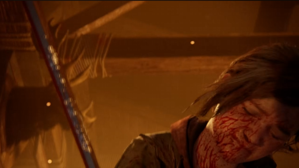 Раненый мужчина склоняется в оранжевом освещении помещения