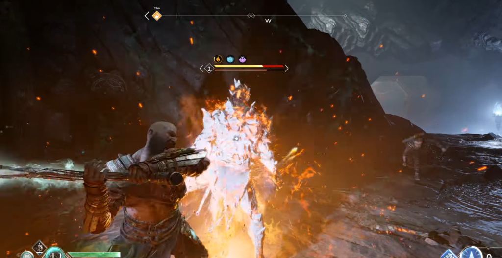 Кратос атакует огненного врага в пещере God of War