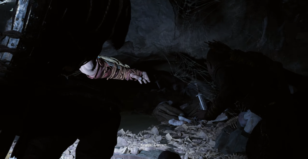 Кратос из God of War указывает в пещере