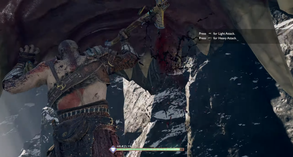 Кратос из God of War бьёт дракона в горах