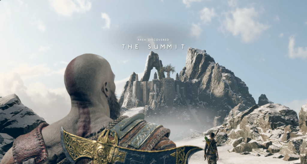 Кратос и Атрей смотрят на горную вершину