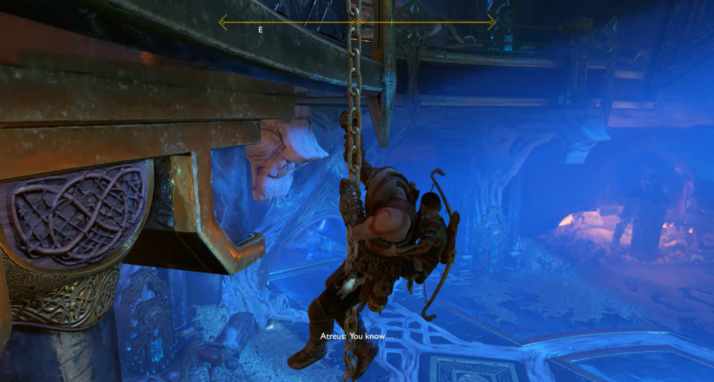 Кратос и Атрей спускаются по цепи в пещере God of War